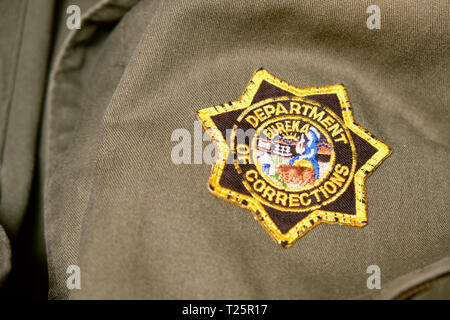 California Department of Corrections uniform patch; star logo on correctional officer uniform; correctional officers. Stock Photo