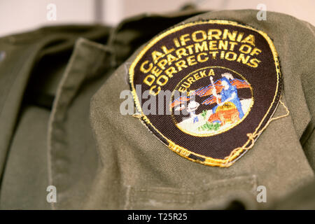 California Department of Corrections uniform patch; logo on correctional officer uniform; correctional officers. Stock Photo