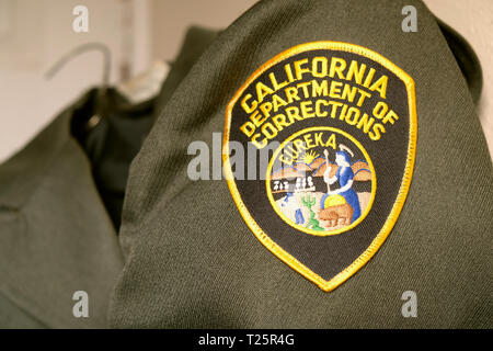 California Department of Corrections uniform patch; logo on correctional officer uniform; correctional officers. Stock Photo