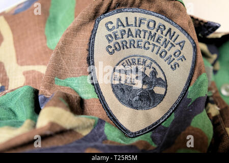 California Department of Corrections uniform patch; logo on correctional officer uniform; correctional officers. Stock Photo