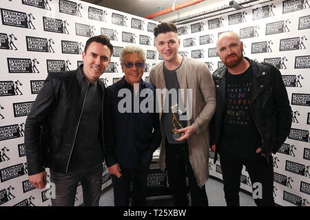 TCT's Honorary Patron Roger Daltrey CBE (second from the left) present The Script with an award during the Teenage Cancer Trust Concert, Royal Albert Hall, London. PRESS ASSOCIATION. Picture date: Saturday March 30, 2019. See PA story SHOWBIZ TCT. Photo credit should read: Isabel Infantes/PA Wire Stock Photo
