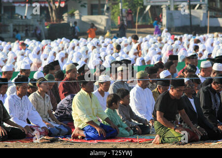 MAUMERE,FLORES/INDONESIA-AUGUST 31 2011: Maumere's Moslem pray together on Eid Mubarak. People in Maumere Flores very kind and care about diversity. Stock Photo
