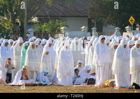MAUMERE,FLORES/INDONESIA-AUGUST 31 2011: Maumere's Moslem pray together on Eid Mubarak. People in Maumere Flores very kind and care about diversity. Stock Photo