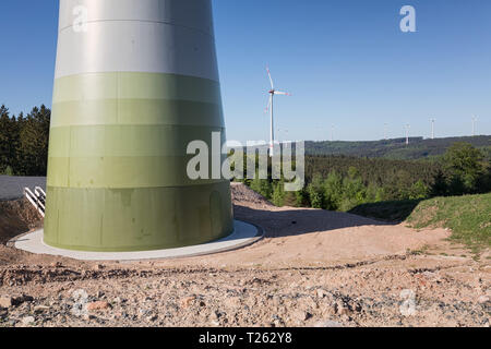 wind turbine in the forest Stock Photo