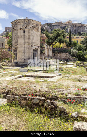 Greece, Athens, Roman Agora, Tower of the Winds with Acropolis in background Stock Photo