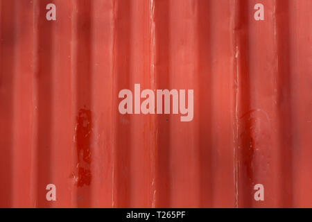 Red metal tile texture. The texture is red. Red wall Stock Photo