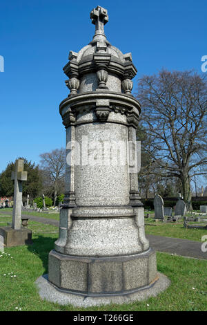 grey granite memorial in isleworth cemetery, middlesex, england, remembering three members of the soap-manufacturing pears family Stock Photo