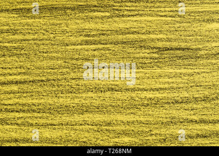 black crayon lines on yellow color paper background texture Stock Photo