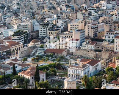 View of Athens, Greece and Roman agora with Tower of Winds and Fethiye mosque at sunset Stock Photo