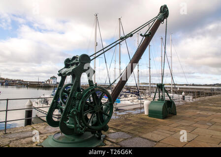 UK, Wales, Gwynedd, Caernarfon, Victoria Dock, old dockside crane. Photo taken on 4th of February 2019 Stock Photo