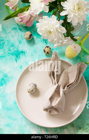 Holidays Easter table Setting with spring flowers. Stock Photo