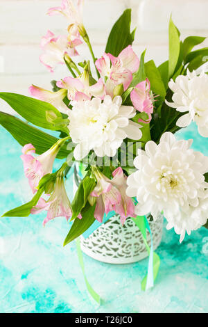 Holidays Easter table Setting with spring flowers. Stock Photo