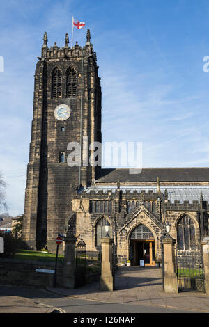 The bell tower (flying the English flag / cross of St George) and clock of Halifax Minster. West Yorkshire. UK. Sunny / sun & blue sky. (106) Stock Photo
