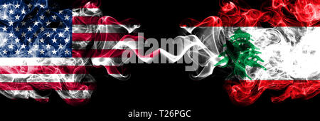 United States of America vs Lebanon, Lebanese smoky mystic flags placed side by side. Thick colored silky smoke flags of America and Lebanon, Lebanese Stock Photo
