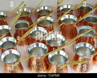 coffee pots made of copper. polished in various sizes