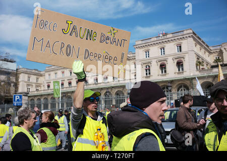 Paris, France.  30th March 2019. 20th wave or yellow Jacket protests. Protesters are gathering at Gare de l'Est. This sign says : Yellow Force ahead, Macron left behind Credit: Roger Ankri/Alamy Live News Stock Photo