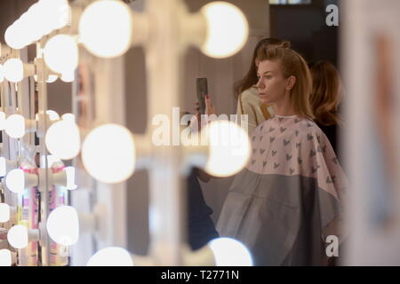 Moscow, Russia. 30th Mar, 2019. A model prepares for the Fashion Week Russia in Moscow, Russia, March 30, 2019. The fashion week would last from March 30 to April 3. Credit: Evgeny Sinitsyn/Xinhua/Alamy Live News Stock Photo