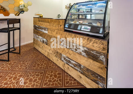 GRODNO, BELARUS - MARCH, 2019: inside interior in small modern pub cafe with loft design style Stock Photo