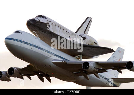 CAPE CANAVERAL, Fla. – A spectacular close up view of space shuttle Discovery, mounted to a Shuttle Carrier Aircraft, or SCA, after it takes off from NASA Kennedy Space Center’s Shuttle Landing Facility runway 15 in Florida at 7 a.m. EDT. Stock Photo