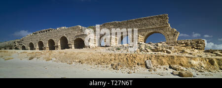 Part of the remains of the Herodian aqueduct near the ancient city of Caesarea, Israel Stock Photo