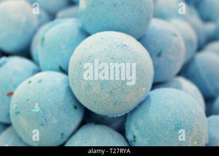 Close up photo of a stack of large, blue bath bombs at a wellness spa Stock Photo