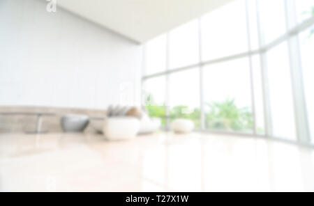 White blur abstract background BLUR OF MODERN BUILDING INTERIOR Stock Photo