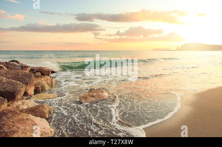 Sea beach with black sand and summer sky Stock Photo