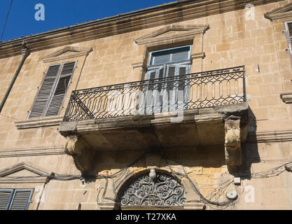 Straying from the main tourist artery, Ledras street, gives sightseers views of interesting buildings and architectural details like this balcony Stock Photo
