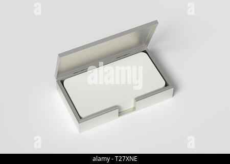 Silver business card box holder with blank business  cards with round corners in stack on white background Stock Photo
