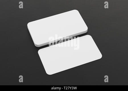 Blank  business cards with round corners on black background Stock Photo