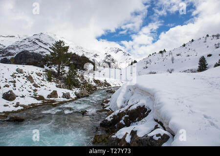 Otal river in Otal Valley with snow, Ordesa y Monte Perdido national park, Aragón, Huesca, Spain. Stock Photo