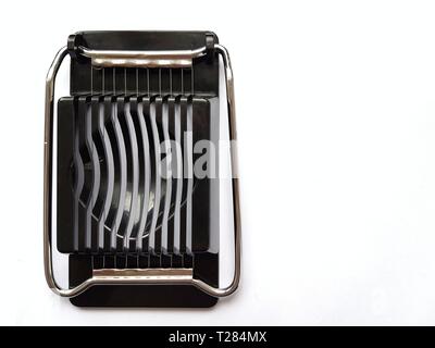 Egg slicer isolated on white background. Stock Photo