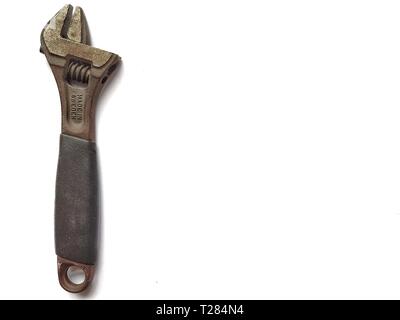 Old rusty wrench isolated on white background Stock Photo