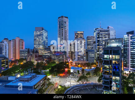 The skyline of the Central Business District (CBD) at night looking towards Cathedral Square, Brisbane, Queensland, Australia Stock Photo