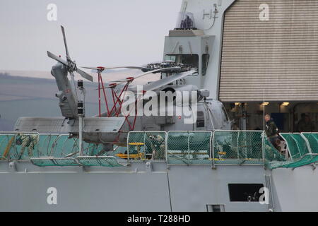N-976, a Sikorsky MH-60R Seahawk operated by the Royal Danish Navy, on board KDM Absalon on arrival during Exercise Joint Warrior 19-1. Stock Photo