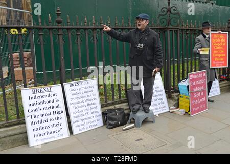 Pro Brexit Christian preachers opposite Parliament with placards during the Meaningful Vote protest and debate at Westminster 15th Jan 2019 Stock Photo