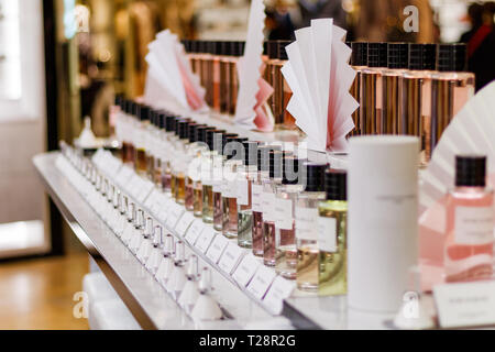 FRANCE, PARIS - NOVEMBER, 18: View at a row of lux niche perfumery fragrances in Christian Dior cosmetic store inside The Gallery Lafayette, Paris Stock Photo