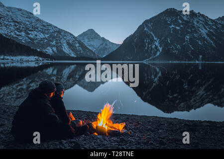 campfire at the lake plansee Stock Photo