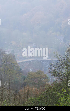 The Ironbridge viewed from Rotunda View on a misty day, Ironbridge, Shropshire, UK. Stock Photo