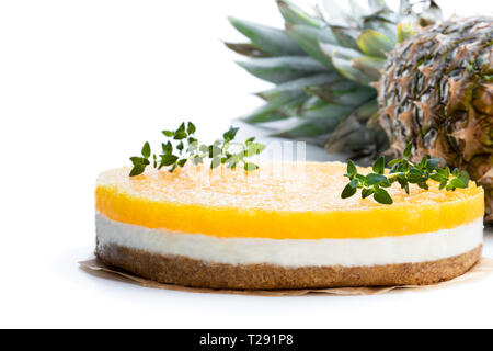 Healthy  layered pineapple cheese cake isolated on white Stock Photo