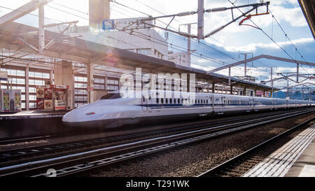 Shinkansen bullet train in station, Himeji, Japan Stock Photo