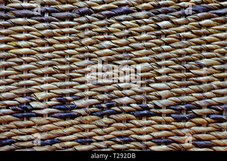 Textured background of a woven bamboo handmade chair Stock Photo
