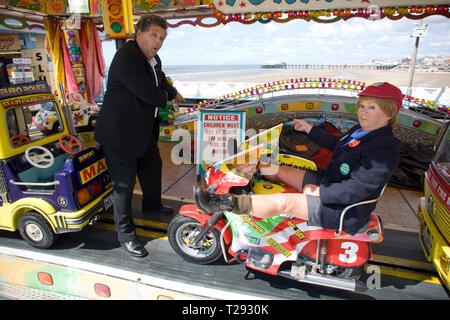 The Krankies pictured on a fairground ride on the Central Pier in Blackpool. The veteran comedians and entertainers were promoting their forthcoming show entitled the Best of British Variety Tour 2008, which also featured Frank Carson, Cannon & Ball, Paul Daniels, Brotherhood of Man and Jimmy Cricket. The duo comprised husband and wife Janette and Ian Tough and as the Krankies they portrayed schoolboy Wee Jimmy Krankie (Janette), and Jimmy's father (Ian), though in their comedy act they also portray other characters. Stock Photo