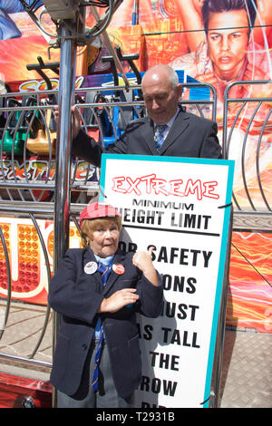 Wee Jimmy Krankie pictured with Tommy Cannon on a fairground ride on the Central Pier in Blackpool. The veteran comedienne and entertainer was promoting her forthcoming show entitled the Best of British Variety Tour 2008, which also featured Frank Carson, Cannon & Ball, Paul Daniels, Brotherhood of Man and Jimmy Cricket. The Krankies comprised husband and wife Janette and Ian Tough and portrayed schoolboy Wee Jimmy Krankie (Janette), and Jimmy's father (Ian), though in their comedy act they also portray other characters. Stock Photo