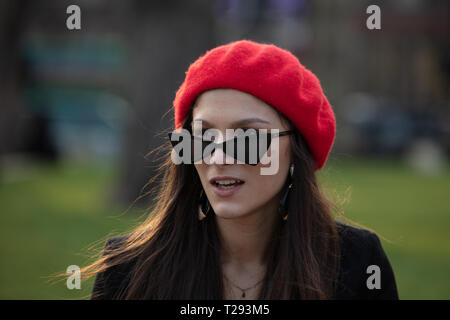 Portrait of a young fashionable and modern woman on Parliament Square, London, England, UK Stock Photo