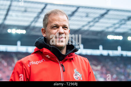 Cologne, Germany. 31st Mar, 2019.  Soccer: 2nd Bundesliga, 1st FC Cologne - Holstein Kiel, 27th matchday in the Rhein-Energie-Stadion. Cologne coach Markus Anfang is on the verge of the game. Photo: Guido Kirchner/dpa - IMPORTANT NOTE: In accordance with the requirements of the DFL Deutsche Fußball Liga or the DFB Deutscher Fußball-Bund, it is prohibited to use or have used photographs taken in the stadium and/or the match in the form of sequence images and/or video-like photo sequences. Credit: dpa picture alliance/Alamy Live News Stock Photo