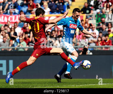 Rome, Italy. 31st Mar, 2019. 31st March 2019, Rome, Italy; Serie A Football, Roma versus Napoli; Arkadiusz Milik of Napoli beats his defender  to score in the 2nd minute for 1-0 Credit: Action Plus Sports Images/Alamy Live News Stock Photo
