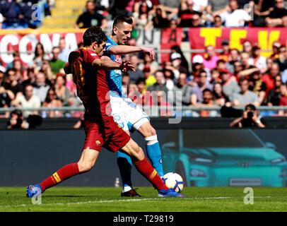 Rome, Italy. 31st Mar, 2019. 31st March 2019, Rome, Italy; Serie A Football, Roma versus Napoli; Arkadiusz Milik of Napoli shoots and scores in the 2nd minute for 1-0 Credit: Action Plus Sports Images/Alamy Live News Stock Photo