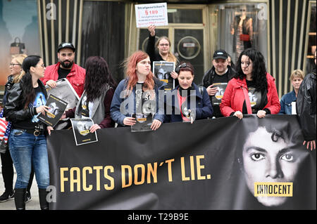 Cologne, Germany. 31st Mar, 2019.  Fans protest with posters and signs against the broadcast of the documentary 'Leaving Neverland' about pop star Michael Jackson on April 6th on ProSieben. Photo: Henning Kaiser/dpa Credit: dpa picture alliance/Alamy Live News Stock Photo