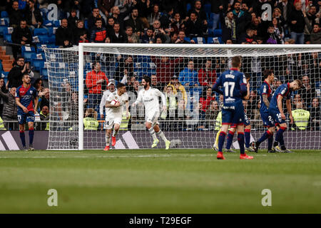 Santiago Bernabeu, Madrid, Spain. 31st Mar, 2019. La Liga football, Real Madrid versus SD Huesca; Francisco Alarcon, ISCO (Real Madrid) celebrates his goal which equalised and made it 1-1 in the 25th minute Credit: Action Plus Sports/Alamy Live News Stock Photo